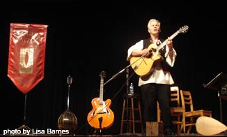 Roger onstage with bouzouki, guitars, saz and piano at Blue Mountain High School, Schuylkill Haven PA in May 2011.  His program, From Ethnofunkology to Ecofunkology highlighted both ethnic and eco-aware music.  The student audience comprised the Green Club, the International Club, the Foreign Language Club and many honors students.  A splendid time was had by all!